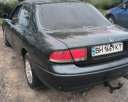 Зелений Мазда 626, об'ємом двигуна 1.8 л та пробігом 455 тис. км за 1752 $, фото 5 на Automoto.ua