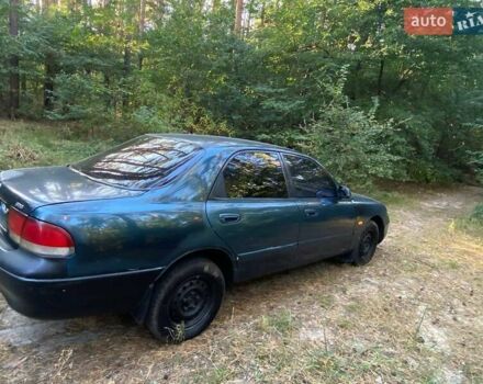 Зеленый Мазда 626, объемом двигателя 2 л и пробегом 340 тыс. км за 1500 $, фото 2 на Automoto.ua