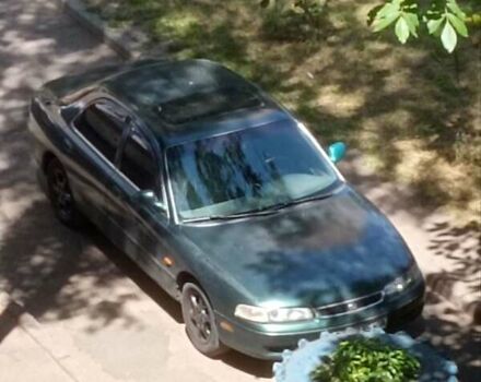 Зеленый Мазда 626, объемом двигателя 1.99 л и пробегом 440 тыс. км за 1900 $, фото 1 на Automoto.ua