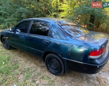 Зеленый Мазда 626, объемом двигателя 2 л и пробегом 340 тыс. км за 1500 $, фото 6 на Automoto.ua