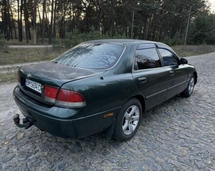 Зеленый Мазда 626, объемом двигателя 2 л и пробегом 265 тыс. км за 2250 $, фото 2 на Automoto.ua