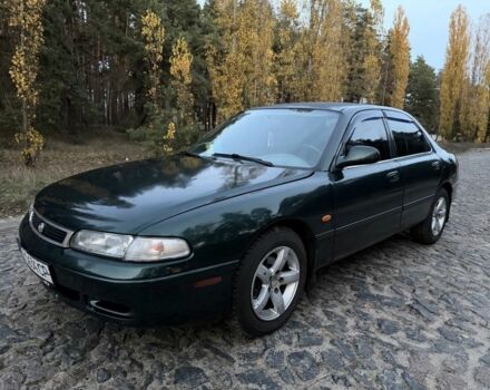 Зеленый Мазда 626, объемом двигателя 2 л и пробегом 265 тыс. км за 2250 $, фото 1 на Automoto.ua