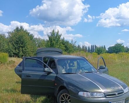 Зеленый Мазда 626, объемом двигателя 2 л и пробегом 365 тыс. км за 500 $, фото 1 на Automoto.ua