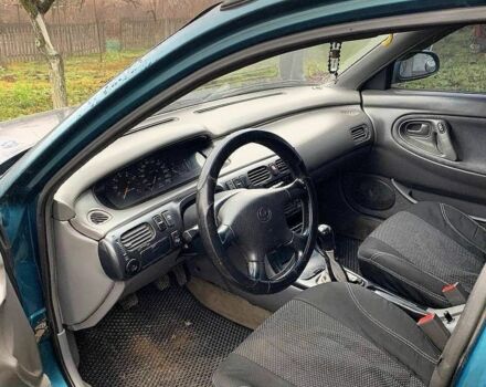 Зеленый Мазда 626, объемом двигателя 2 л и пробегом 1 тыс. км за 3074 $, фото 3 на Automoto.ua