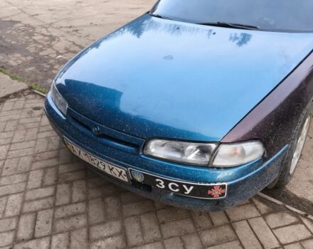 Зеленый Мазда 626, объемом двигателя 1.8 л и пробегом 330 тыс. км за 1000 $, фото 1 на Automoto.ua