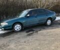 Зеленый Мазда 626, объемом двигателя 2 л и пробегом 50 тыс. км за 900 $, фото 1 на Automoto.ua