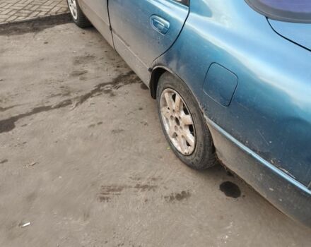 Зеленый Мазда 626, объемом двигателя 1.8 л и пробегом 330 тыс. км за 1000 $, фото 2 на Automoto.ua