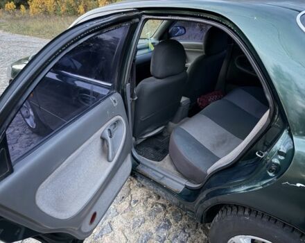 Зеленый Мазда 626, объемом двигателя 2 л и пробегом 265 тыс. км за 2250 $, фото 12 на Automoto.ua