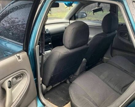 Зеленый Мазда 626, объемом двигателя 2 л и пробегом 1 тыс. км за 3074 $, фото 2 на Automoto.ua