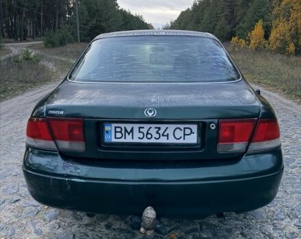 Зеленый Мазда 626, объемом двигателя 2 л и пробегом 265 тыс. км за 2250 $, фото 4 на Automoto.ua
