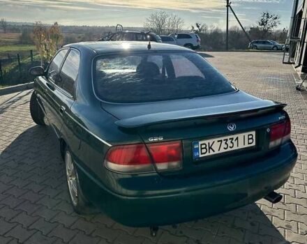 Зеленый Мазда 626, объемом двигателя 2 л и пробегом 300 тыс. км за 1300 $, фото 6 на Automoto.ua