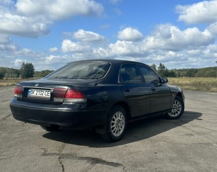 Зеленый Мазда 626, объемом двигателя 2 л и пробегом 342 тыс. км за 1450 $, фото 3 на Automoto.ua