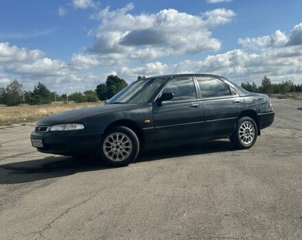 Зеленый Мазда 626, объемом двигателя 2 л и пробегом 342 тыс. км за 1450 $, фото 1 на Automoto.ua