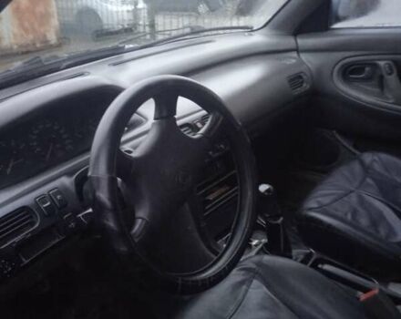 Зеленый Мазда 626, объемом двигателя 2 л и пробегом 200 тыс. км за 1500 $, фото 1 на Automoto.ua