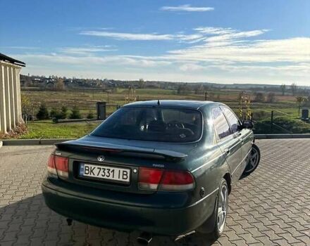 Зеленый Мазда 626, объемом двигателя 2 л и пробегом 300 тыс. км за 1300 $, фото 11 на Automoto.ua