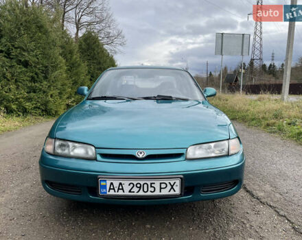 Зеленый Мазда 626, объемом двигателя 2 л и пробегом 401 тыс. км за 1750 $, фото 1 на Automoto.ua