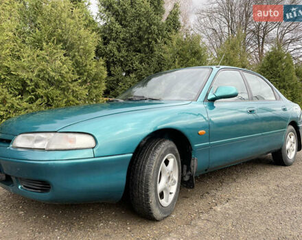 Зеленый Мазда 626, объемом двигателя 2 л и пробегом 401 тыс. км за 1750 $, фото 3 на Automoto.ua