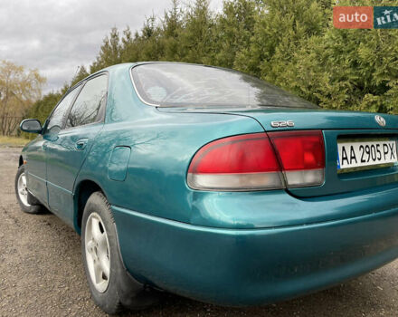 Зеленый Мазда 626, объемом двигателя 2 л и пробегом 401 тыс. км за 1750 $, фото 13 на Automoto.ua