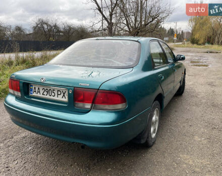 Зеленый Мазда 626, объемом двигателя 2 л и пробегом 401 тыс. км за 1750 $, фото 10 на Automoto.ua