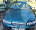 Зеленый Мазда 626, объемом двигателя 2 л и пробегом 313 тыс. км за 2300 $, фото 1 на Automoto.ua
