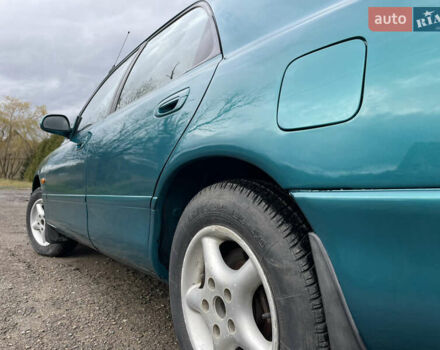 Зеленый Мазда 626, объемом двигателя 2 л и пробегом 401 тыс. км за 1750 $, фото 14 на Automoto.ua