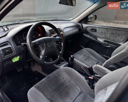 Зеленый Мазда 626, объемом двигателя 2 л и пробегом 309 тыс. км за 2100 $, фото 8 на Automoto.ua