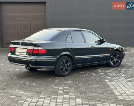 Зеленый Мазда 626, объемом двигателя 2 л и пробегом 309 тыс. км за 2100 $, фото 5 на Automoto.ua