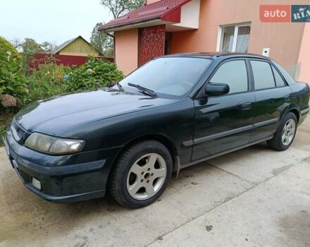 Зеленый Мазда 626, объемом двигателя 2 л и пробегом 270 тыс. км за 1800 $, фото 7 на Automoto.ua