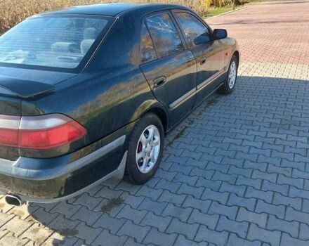 Зеленый Мазда 626, объемом двигателя 2 л и пробегом 378 тыс. км за 2600 $, фото 5 на Automoto.ua