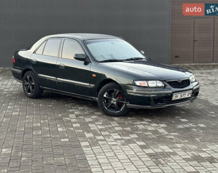 Зеленый Мазда 626, объемом двигателя 2 л и пробегом 309 тыс. км за 2100 $, фото 2 на Automoto.ua