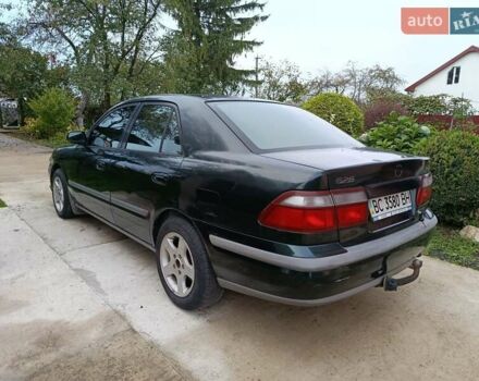 Зеленый Мазда 626, объемом двигателя 2 л и пробегом 270 тыс. км за 1800 $, фото 10 на Automoto.ua