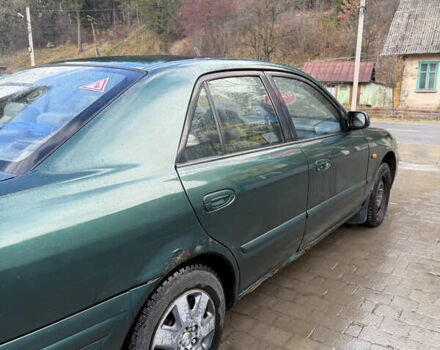 Зеленый Мазда 626, объемом двигателя 2 л и пробегом 356 тыс. км за 2100 $, фото 18 на Automoto.ua