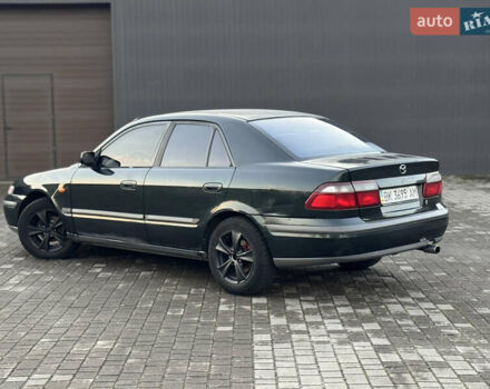 Зеленый Мазда 626, объемом двигателя 2 л и пробегом 309 тыс. км за 2100 $, фото 7 на Automoto.ua