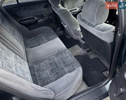 Зеленый Мазда 626, объемом двигателя 2 л и пробегом 309 тыс. км за 2100 $, фото 13 на Automoto.ua