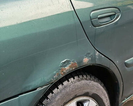 Зеленый Мазда 626, объемом двигателя 2 л и пробегом 356 тыс. км за 2100 $, фото 19 на Automoto.ua