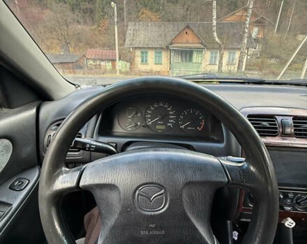 Зеленый Мазда 626, объемом двигателя 2 л и пробегом 356 тыс. км за 2100 $, фото 6 на Automoto.ua