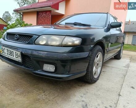 Зеленый Мазда 626, объемом двигателя 2 л и пробегом 270 тыс. км за 1800 $, фото 2 на Automoto.ua