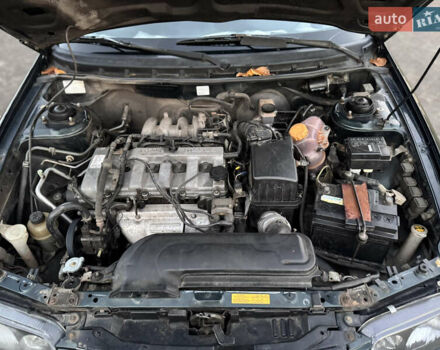 Зеленый Мазда 626, объемом двигателя 2 л и пробегом 309 тыс. км за 2100 $, фото 15 на Automoto.ua