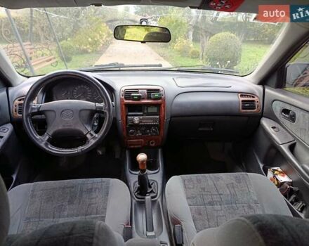 Зеленый Мазда 626, объемом двигателя 2 л и пробегом 270 тыс. км за 1800 $, фото 6 на Automoto.ua