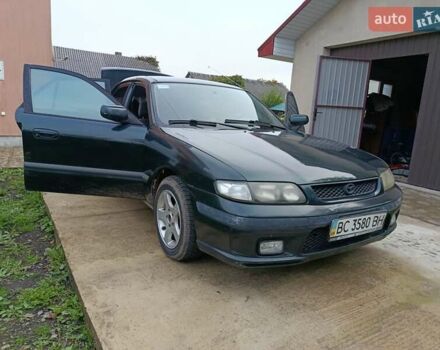 Зеленый Мазда 626, объемом двигателя 2 л и пробегом 270 тыс. км за 1800 $, фото 11 на Automoto.ua