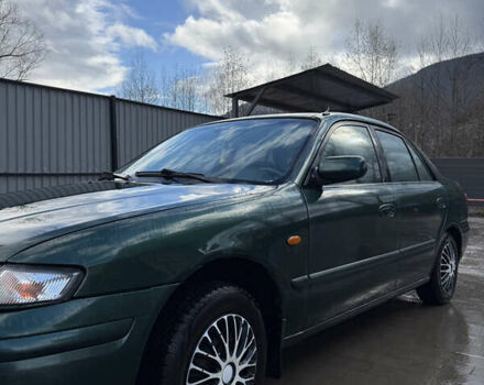 Зеленый Мазда 626, объемом двигателя 2 л и пробегом 356 тыс. км за 2100 $, фото 1 на Automoto.ua