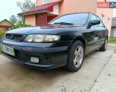 Зеленый Мазда 626, объемом двигателя 2 л и пробегом 270 тыс. км за 1800 $, фото 1 на Automoto.ua