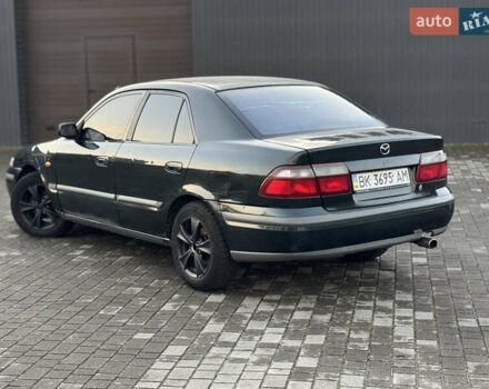 Зеленый Мазда 626, объемом двигателя 2 л и пробегом 309 тыс. км за 2100 $, фото 6 на Automoto.ua