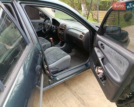 Зеленый Мазда 626, объемом двигателя 2 л и пробегом 270 тыс. км за 1800 $, фото 14 на Automoto.ua