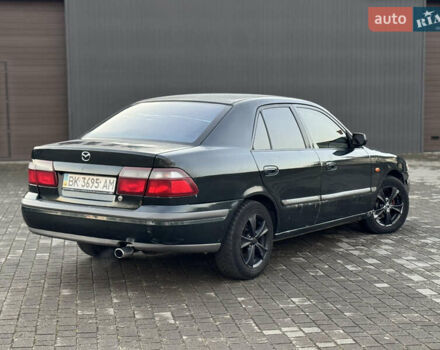 Зеленый Мазда 626, объемом двигателя 2 л и пробегом 309 тыс. км за 2100 $, фото 4 на Automoto.ua