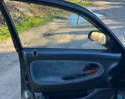 Зеленый Мазда 626, объемом двигателя 2.02 л и пробегом 300 тыс. км за 1450 $, фото 6 на Automoto.ua