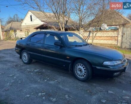 Зеленый Мазда 626, объемом двигателя 2.02 л и пробегом 300 тыс. км за 1450 $, фото 1 на Automoto.ua