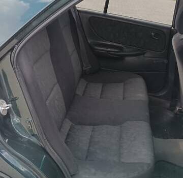 Зеленый Мазда 626, объемом двигателя 1.84 л и пробегом 319 тыс. км за 1700 $, фото 8 на Automoto.ua