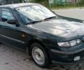 Зеленый Мазда 626, объемом двигателя 1.84 л и пробегом 319 тыс. км за 1700 $, фото 1 на Automoto.ua