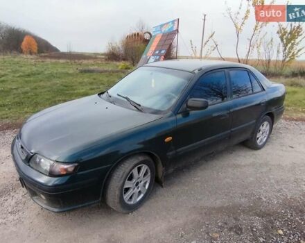 Зеленый Мазда 626, объемом двигателя 1.84 л и пробегом 421 тыс. км за 2500 $, фото 1 на Automoto.ua